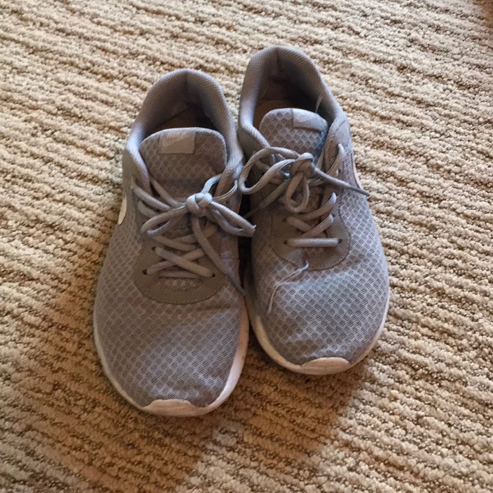 Grey Nike tennis shoes